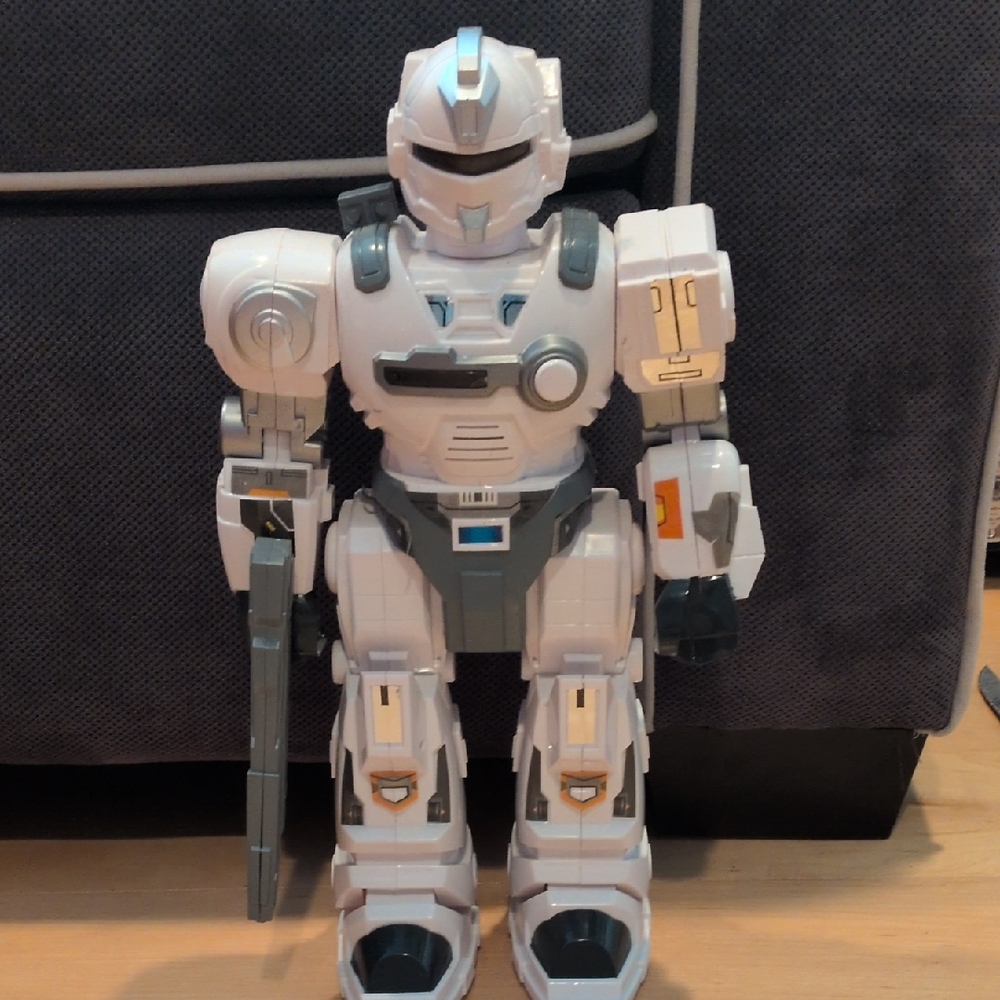 White and Gray Action Robot Figure